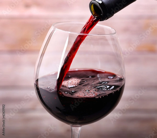 Obraz Pouring red wine into glass