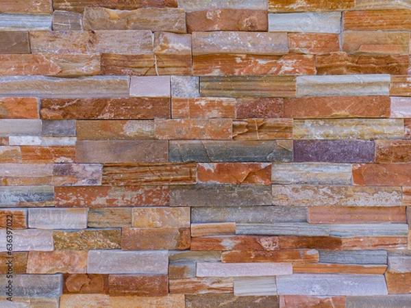 Fototapeta Background pattern of differently colored natural stones