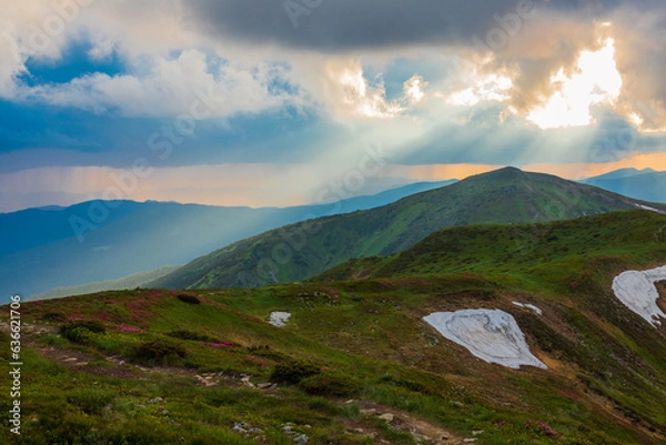Fototapeta The evening sky over the mountains.