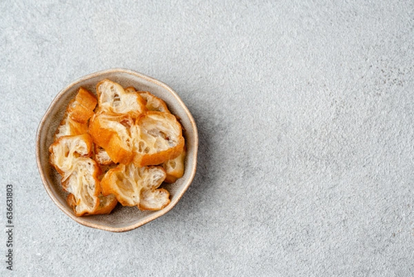 Fototapeta Youtiao or Yu Char Kway is a long golden-brown deep-fried strip of wheat flour dough of Chinese origin