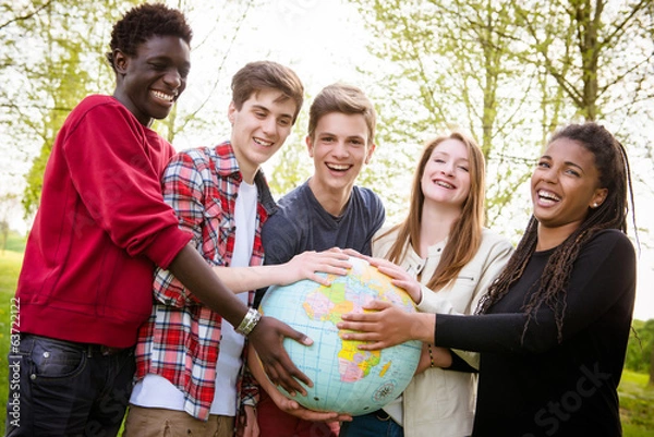 Obraz Multiracial Teen Couple Holding Globe Map