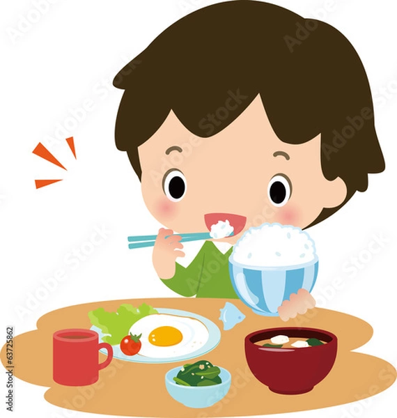 Fototapeta 朝ごはんを食べる男の子