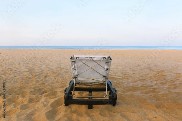 Fototapeta Sunbeds, Beach loungers, Relaxation, Beachside, Umbrellas, one sunbed