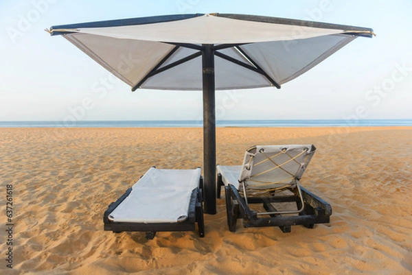Obraz Sunbeds, Beach loungers, Relaxation, Beachside, Umbrellas,