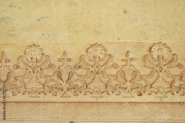 Fototapeta Intricate carving at Gatore Ki Chhatriyan ( royal crematorium grounds ) , Jaipur, Rajasthan, India
