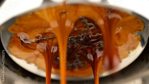 Fototapeta Pouring coffee espresso stream through Bottomless Portafilter