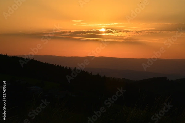 Fototapeta soleil d'aout à son coucher,