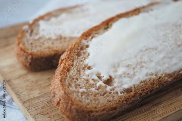 Obraz cheese cream spread on fresh bread 