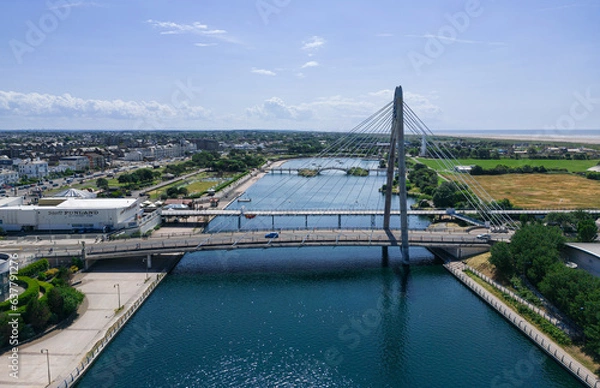 Obraz Southport, Merseyside, UK, June 21, 2023; Aerial view of the Millennium Bridge and Marine Lake in the afternoon sun Southport Merseyside