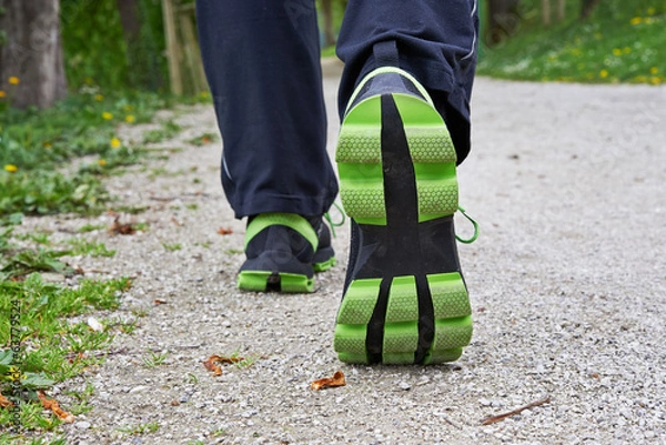 Fototapeta Two legs walking in spring park