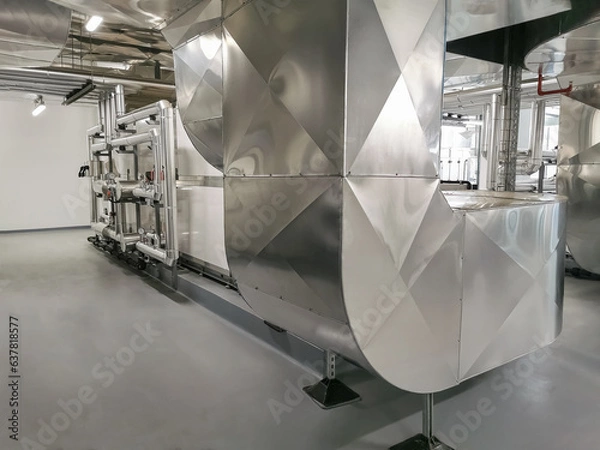 Obraz Industrial system with stainless steel ducts, forced ventilation of buildings and industrial equipment, large metallic ducts for air inlet and outlet, air renewal, industrial HVAC system