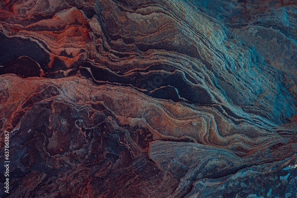 Fototapeta natural stone in the rocky mountains, the texture of slate and stone ore close-up.