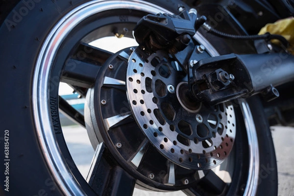 Obraz Close-up of a wheel with a motor of an electric motorcycle. 