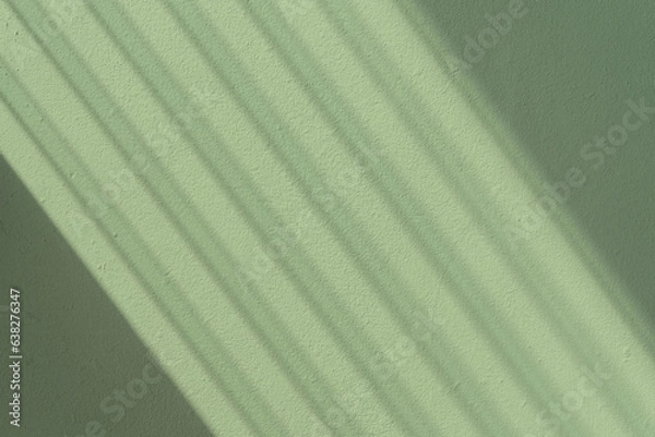 Fototapeta Green concrete wall abstract background with lines shadow