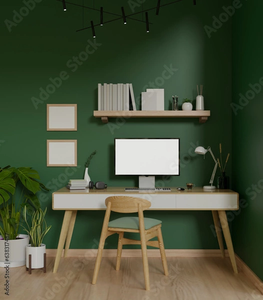 Fototapeta Modern trendy workspace with a computer on a minimal wooden desk against the green wall
