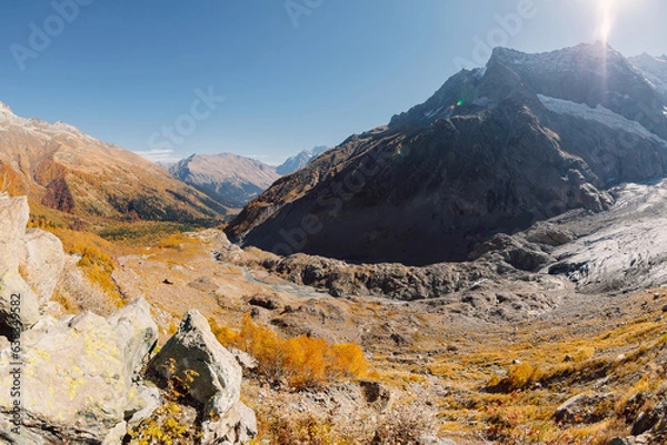 Fototapeta Rocky mountains and glacier. Peak of mountain and glacier. Fish eye view.