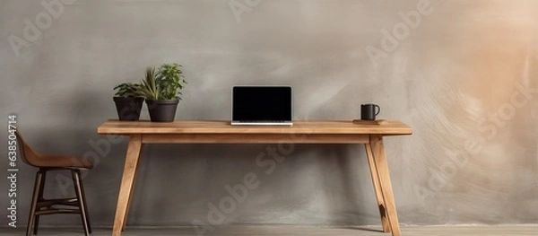 Fototapeta Laptop on high wooden table in modern interior for standing work