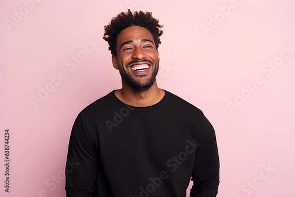 Fototapeta Portrait of a young man smiling at the camera