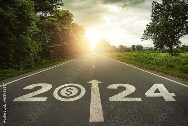 Fototapeta New year 2024 and business performance target concept. Dollar money symbol and text 2024 written on the road at sunset. Concept of planning, challenge, business strategy, opportunities, performance.