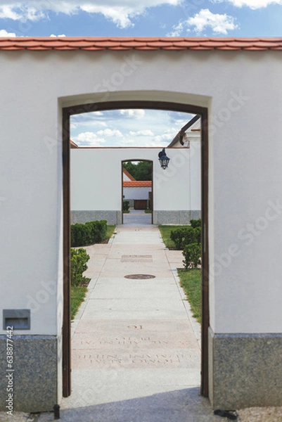 Fototapeta Exit from monks' small garden in Camaldolese monastery. Wigry, Poland