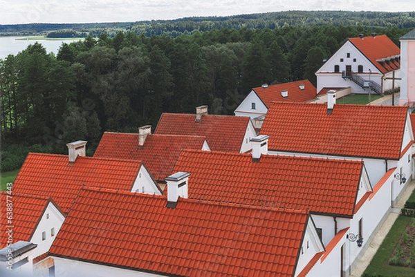 Fototapeta Top view of red tile roofs of Camaldolese monk's houses in Post-Camaldolese monastery