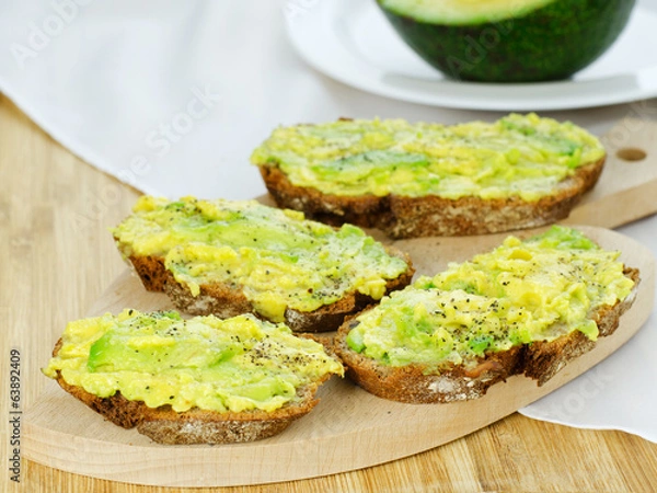 Fototapeta Avocado on bread