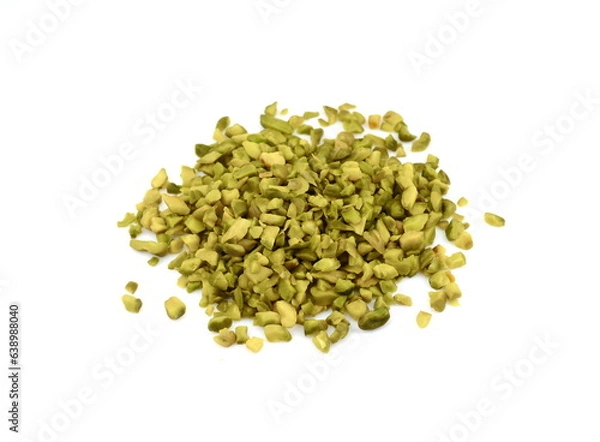 Fototapeta Ground, milled, crushed or granulated pistachio pile isolated on white background