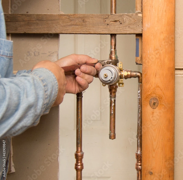 Obraz Plumber install shower