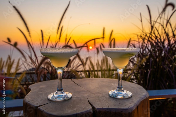 Fototapeta cocktail on the sunset