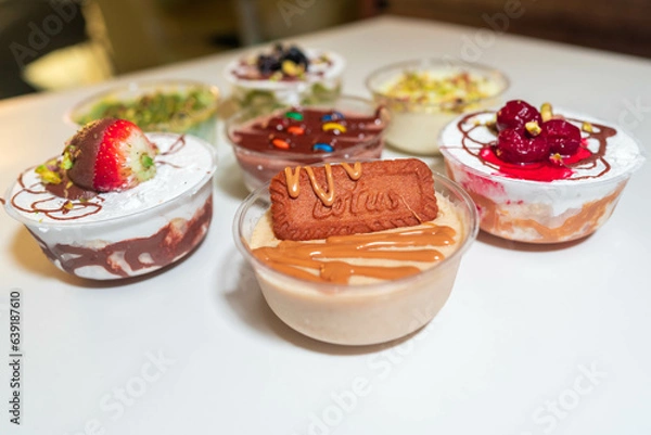 Obraz Yummy sweets made of cream cakes with variety of flavors - Chocolate cream round dessert
