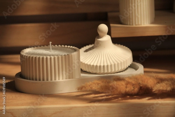 Obraz sand candle in plaster jar