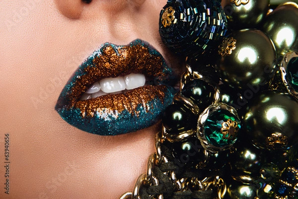 Obraz Blue and golden lips with jewelry. Make up