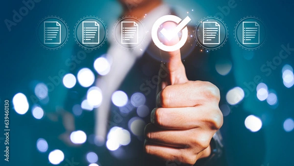 Fototapeta Businessman check and check mark online and thumbs up to approve report document through a virtual screen.