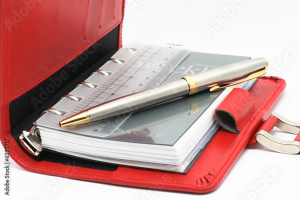 Obraz REd notebook on white background