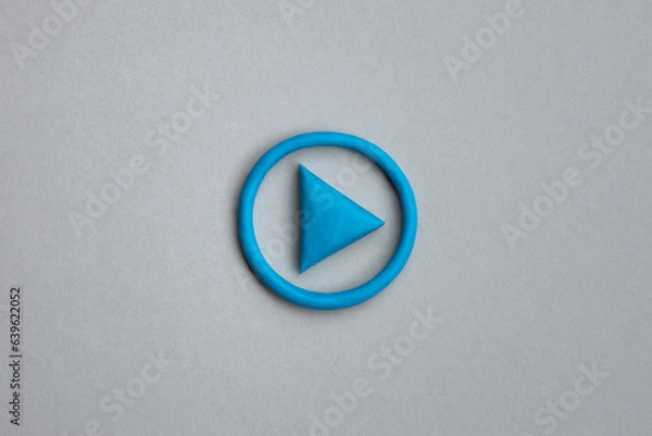 Fototapeta  3d simple play button, 3d media play sign on grey background. Plasticine object. Control panel concept.
