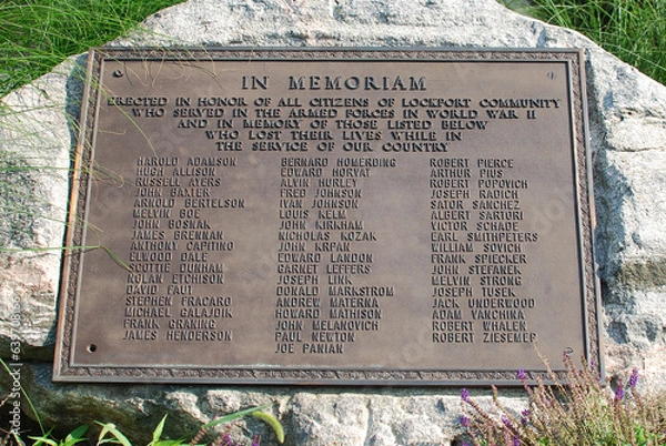 Obraz AUGUST 18, 2023. LOCKPORT, ILLINOIS, USA. A plaque honoring Lockport citizens who served in the military during World War II. It is in front of City Hall, also called the Central Square building.