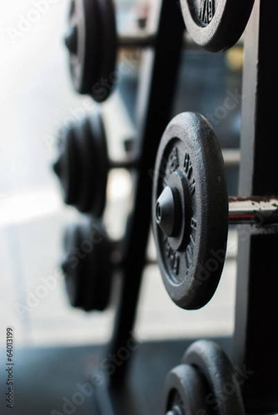 Obraz weights on a rack in the gym