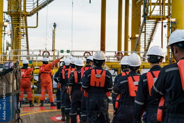 Obraz Traveling by boat to go back to accommodation and go to work at the petroleum drilling rig.