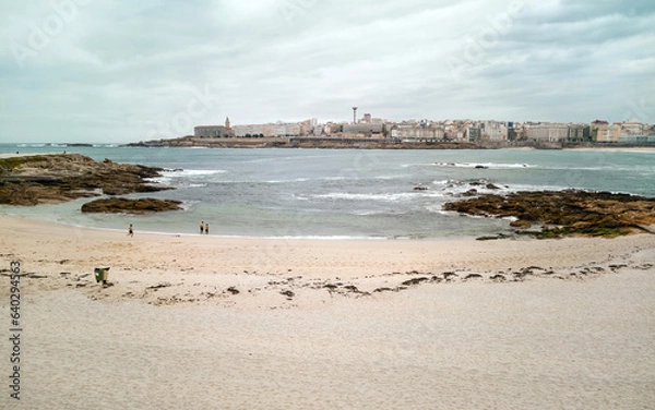 Fototapeta  The two shores of the bay with City of A Coruña from Playa de Riazor