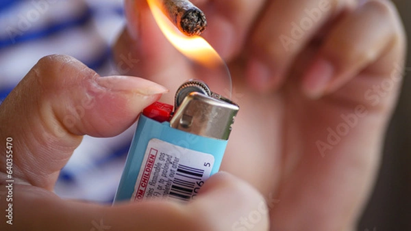 Obraz flame toughing weed cigarette