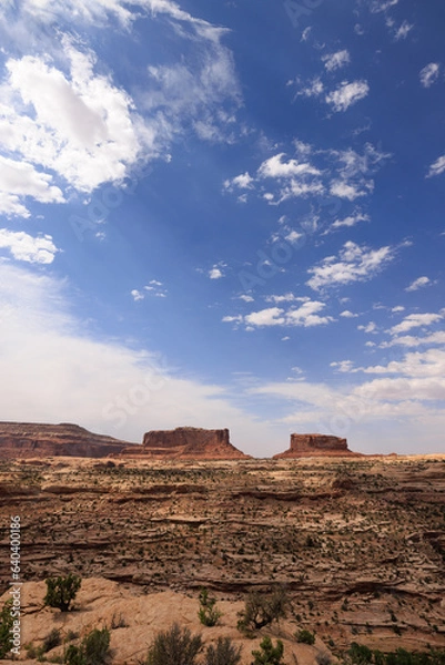 Obraz mesas under a blue sky with clouds at noon