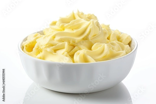 Fototapeta Bowl of butter curls isolated on white background
