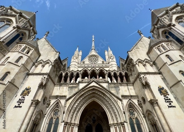 Fototapeta Low angle view of the Royal Courts of Justice building in London, UK. 