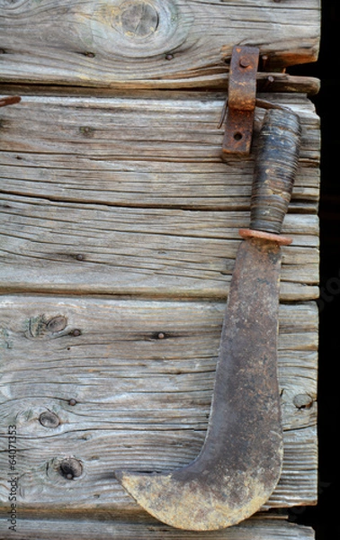 Obraz roncola appesa alla porta