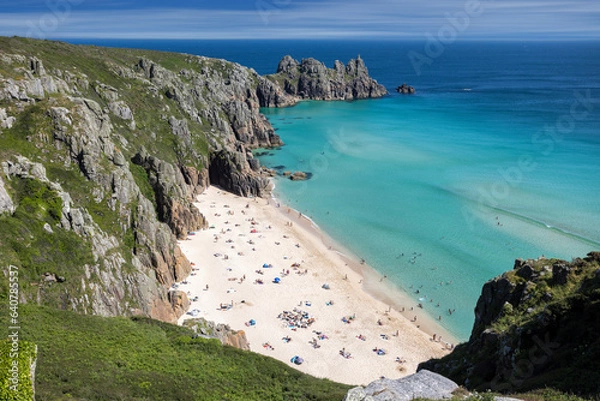 Fototapeta View from the South West Coast Path looking down on Treen Bay with Logan Rock behind.