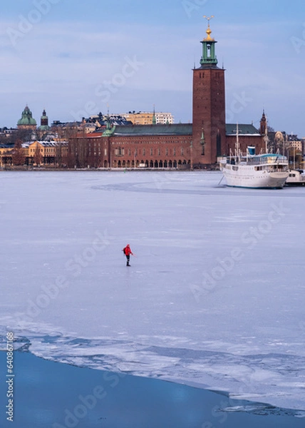 Obraz ice skating in front of the stockholm city hall