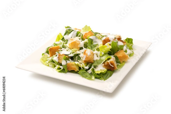 Obraz Caesar salad in a white plate