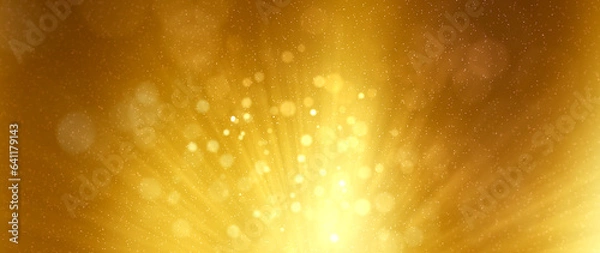 Fototapeta Golden particles shining stars dust bokeh glitter with flare awards abstract background. Futuristic glittering in space on gold color background.