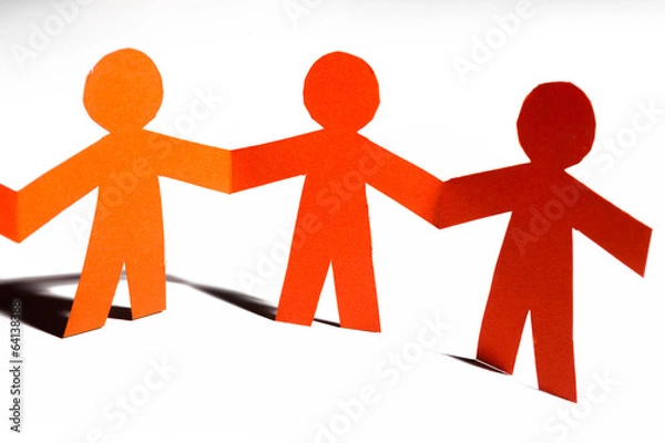 Fototapeta Paper team linked together partnership concept