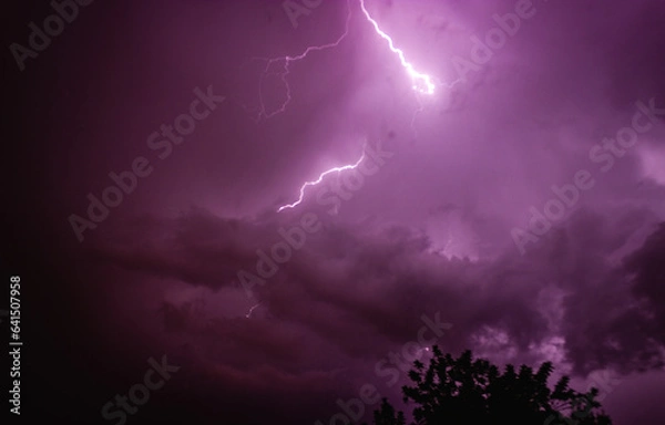 Fototapeta lightning in the algarve night sky